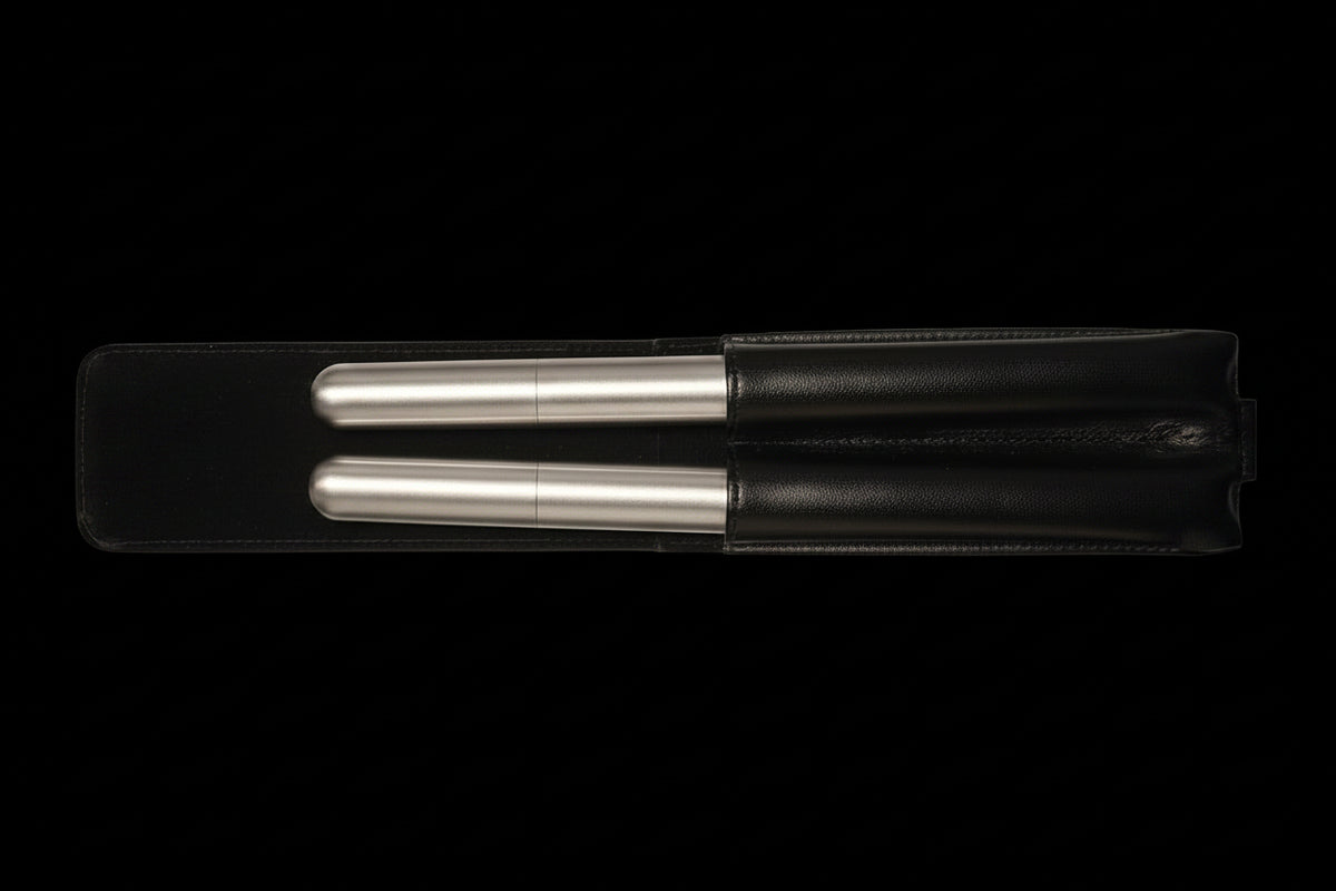 stainless steel flask and cigar holder combo set housed in a black leather  pouch