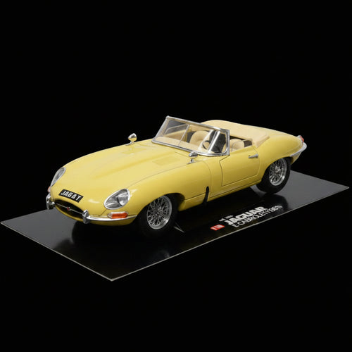 Bburago 1/18 scale 1961 Jaguar E-Type Cabriolet in a pale primrose yellow finish Made in Italy